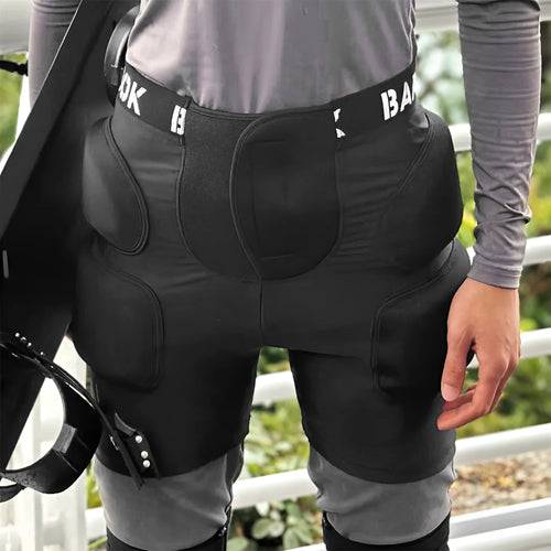 Black roller skating hip protection pants with NBR foam padding for fall safety