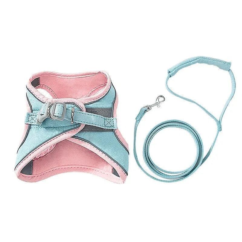 Blue and orange stitched suede cat vest harness with reflective chest strip and attached hand holding rope.