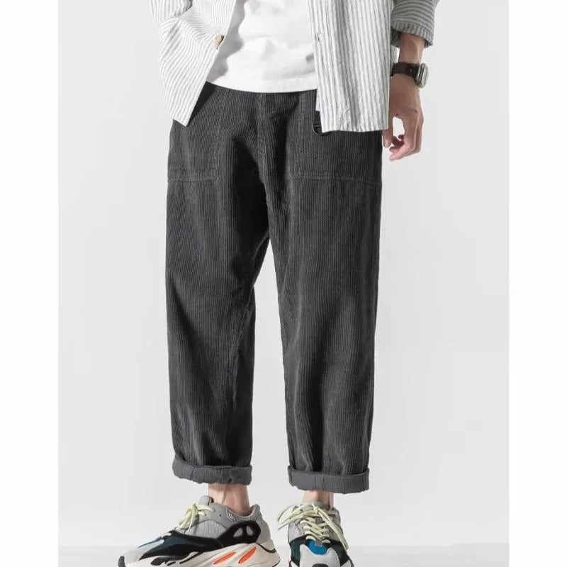 Loose straight-leg pants with tapered wide-leg design in chemical fibre blend fabric