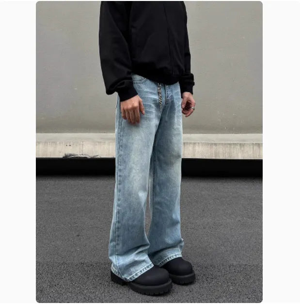 Men's blue straight jeans with whisker washing on thighs and flared leg design