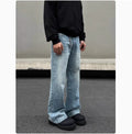 Men's blue straight jeans with whisker washing on thighs and flared leg design