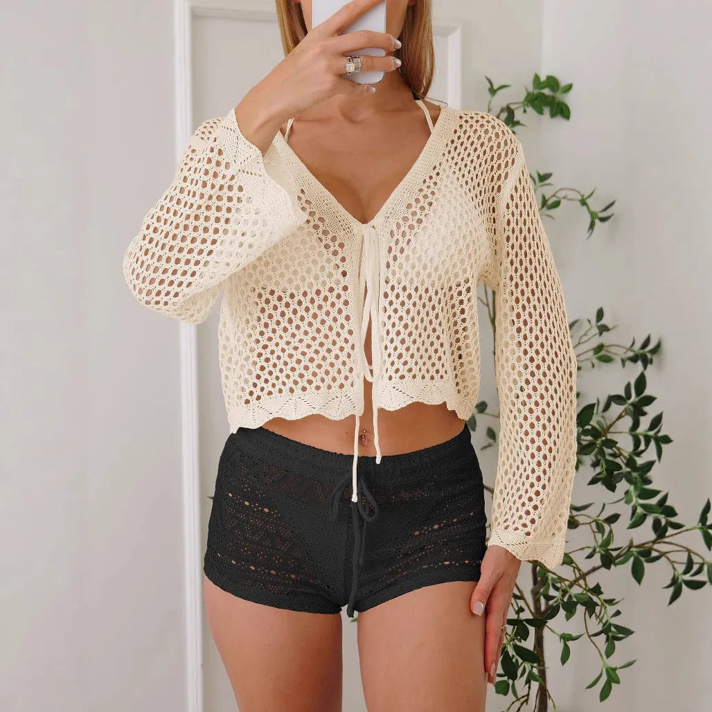 Cotton-like women's hollow woven cardigan blouse with bell sleeves in apricot colour.