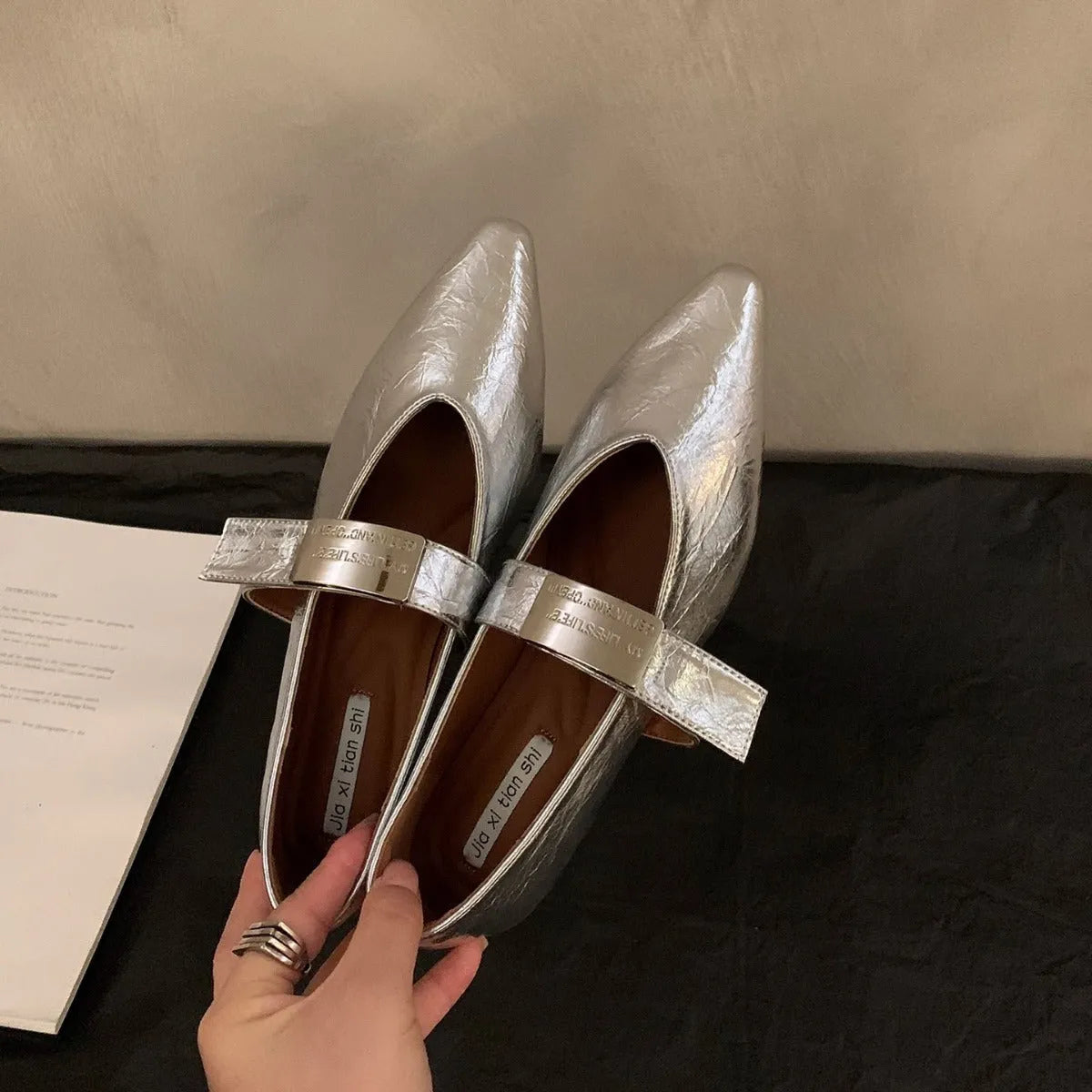 Women's black microfiber Mary Jane shoes with silver pointed toe detail and buckle fastening