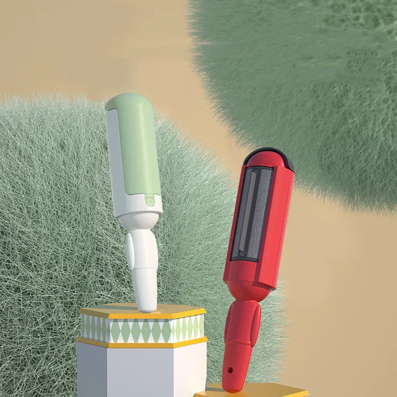 White green pet hair remover roller with self-cleaning base and non-slip handle on a carpet.