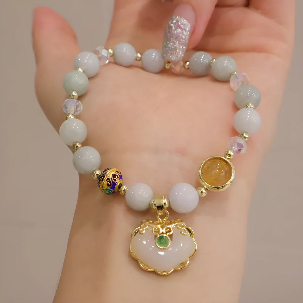 Women's geometric bracelet with grey jade and strawberry quartz options featuring three-dimensional metal ethnic decoration