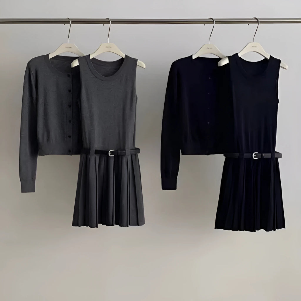 Women's grey Art Retro knitted set with 3D pattern, featuring a pleated midi skirt and long-sleeve cardigan.