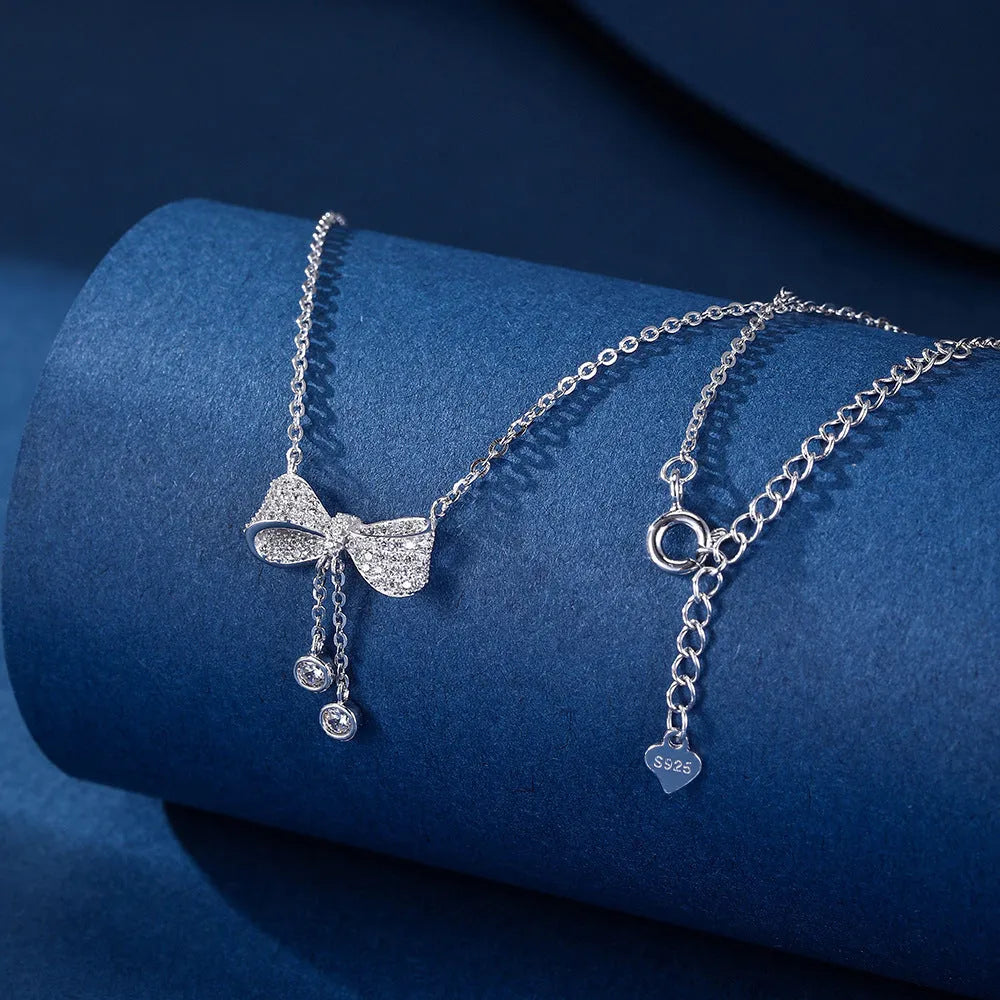 S925 sterling silver necklace with bow pendant on 40-45cm O-ring chain