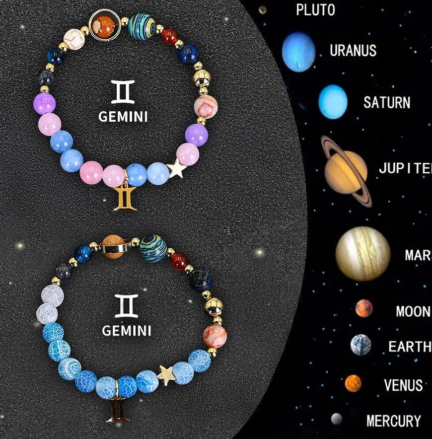 Two adjustable natural stone bead bracelets on a wrist, showing brass slide clasp and 8mm zodiac charm.