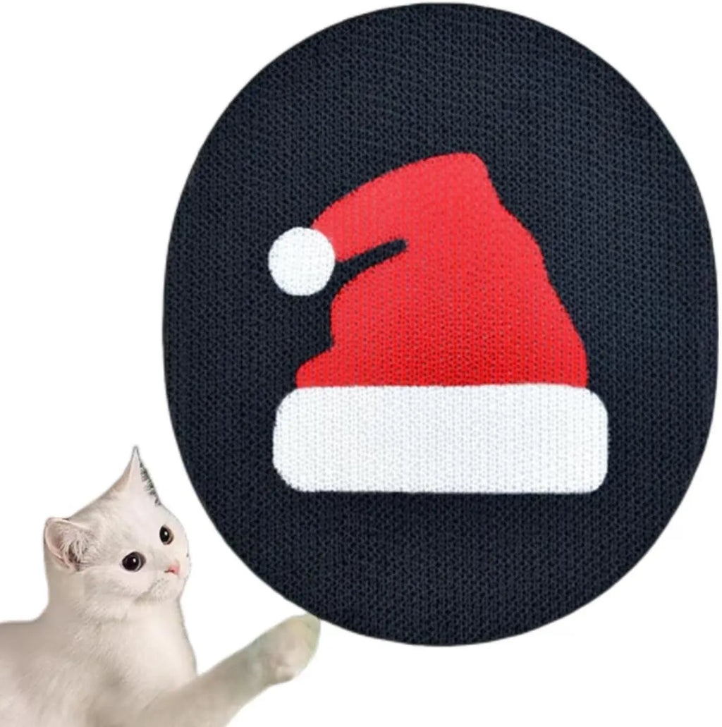 Wall-mounted corrugated cardboard cat scratcher pad with catnip on a white wall