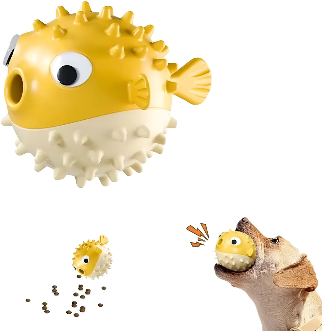 Green fish-shaped interactive dog toy with textured surface for treat dispensing and chewing.