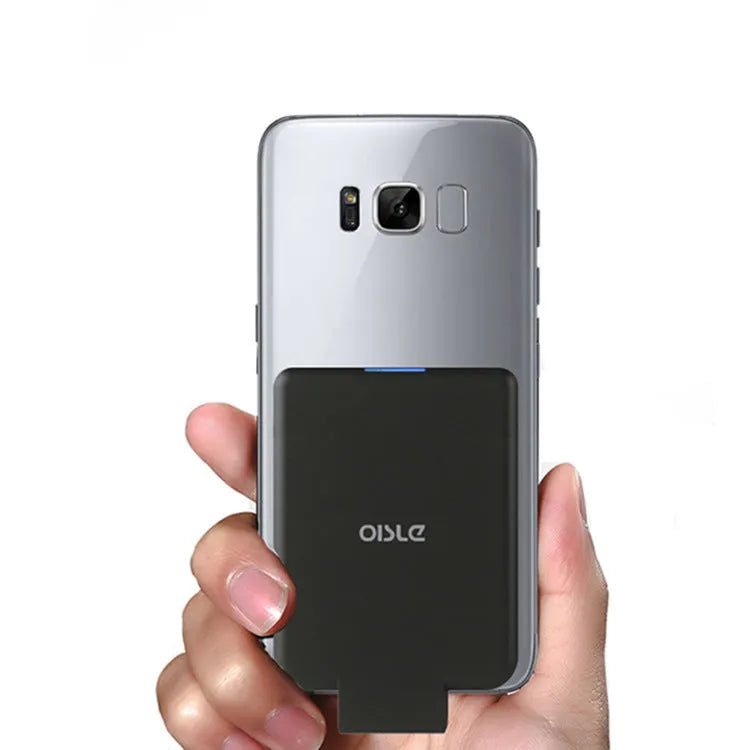 MP282P back clip battery power bank in multiple colours next to a smartphone.