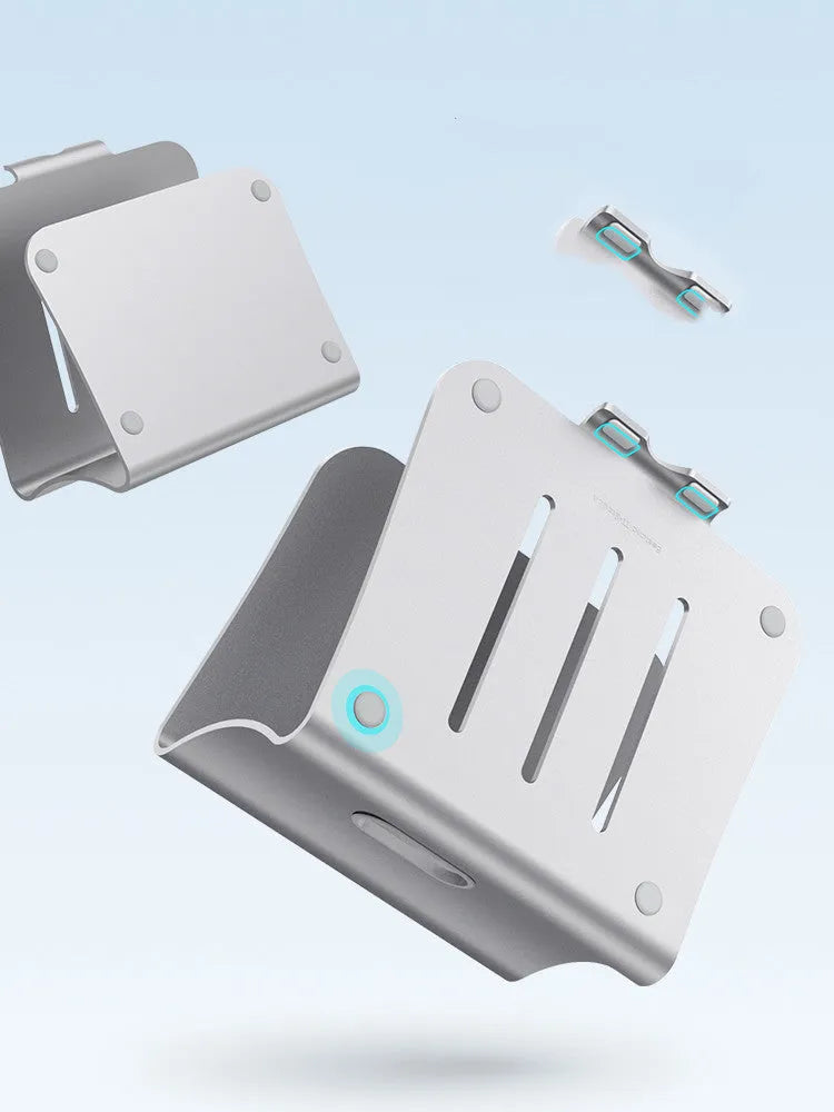 Silver aluminium laptop cooling bracket with striped texture on a wooden desk, rotated at an angle.