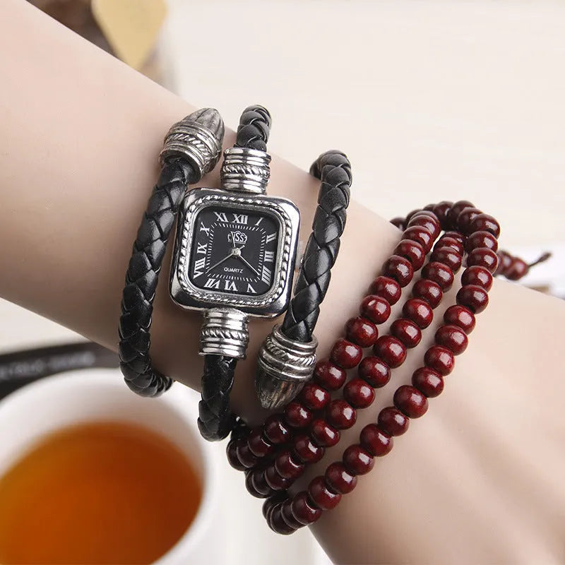 Snake bracelet quartz watch with leather strap and alloy buckle in black colour option