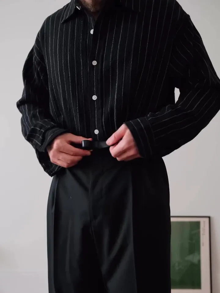 Black pinstripe polyester button-down shirt with regular fit and long sleeves
