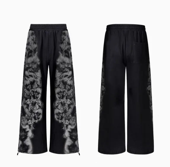 Women's grey printed hoodie, matching loose trousers, and seven-inch shorts laid flat as a three-piece co-ord set.