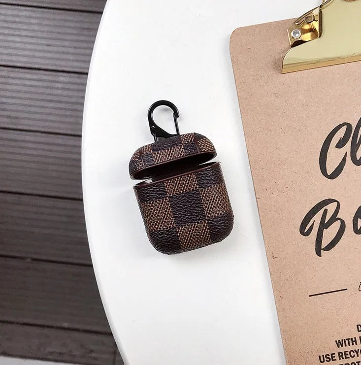 Black leather grid hard shell protective case for iPhone XS Max with anti-lost hook for Bluetooth headset.