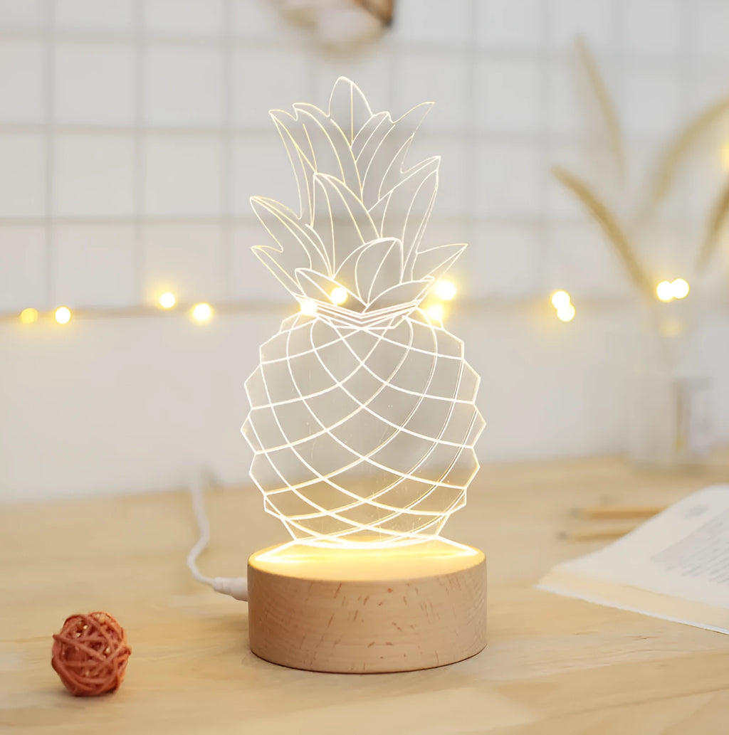 Cartoon pineapple-shaped bedside night light with wooden base and acrylic shade, showing dimmer switch and USB cable.