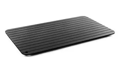 Black aluminium kitchen defrosting tray for thawing frozen meat and food without electricity