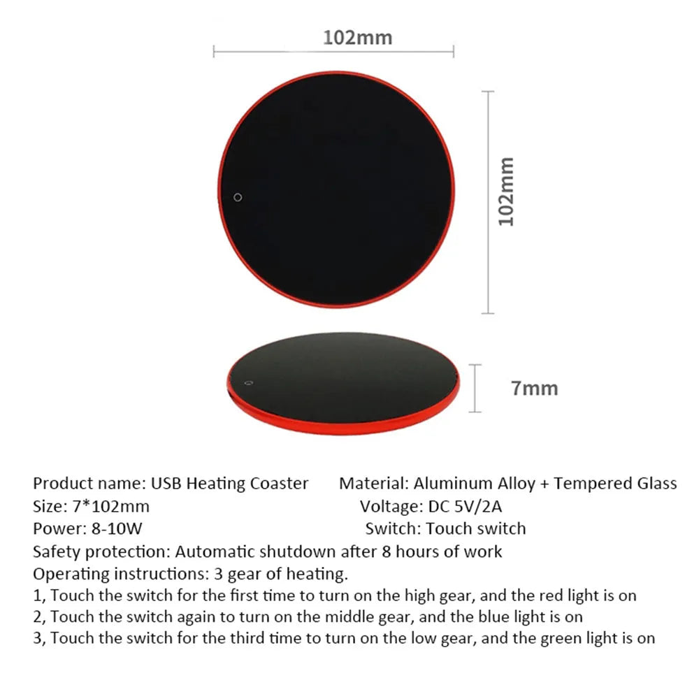 Black USB-powered beverage heating coaster with touch control and coloured LED lights on a wooden desk.