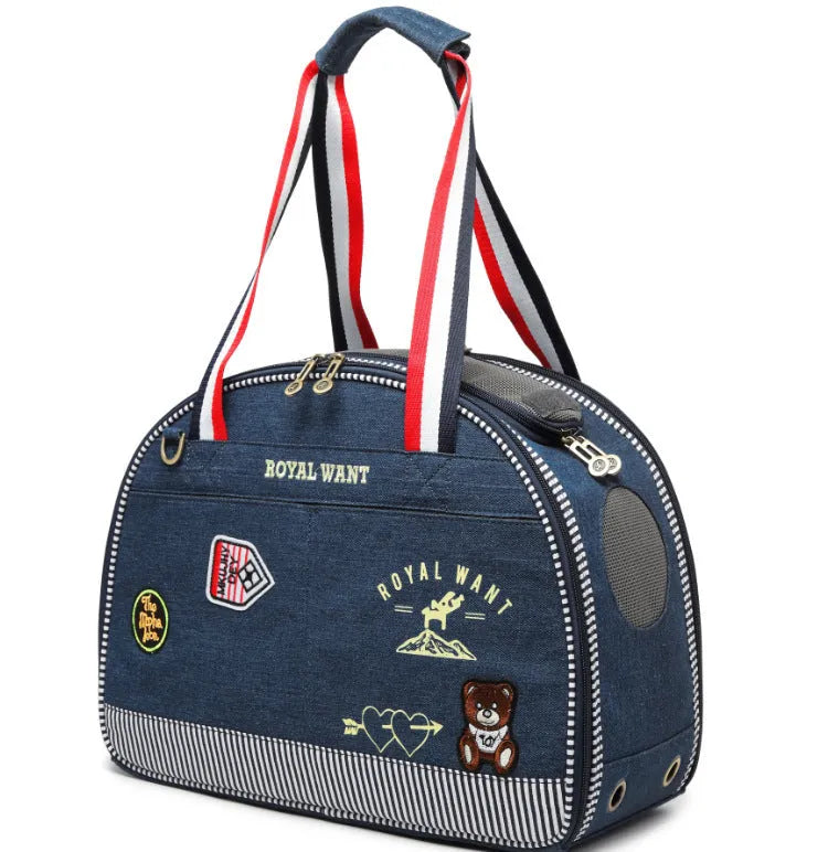 Blue denim pet diaper bag with cartoon pattern, dimensions 43cm by 20cm by 30cm.