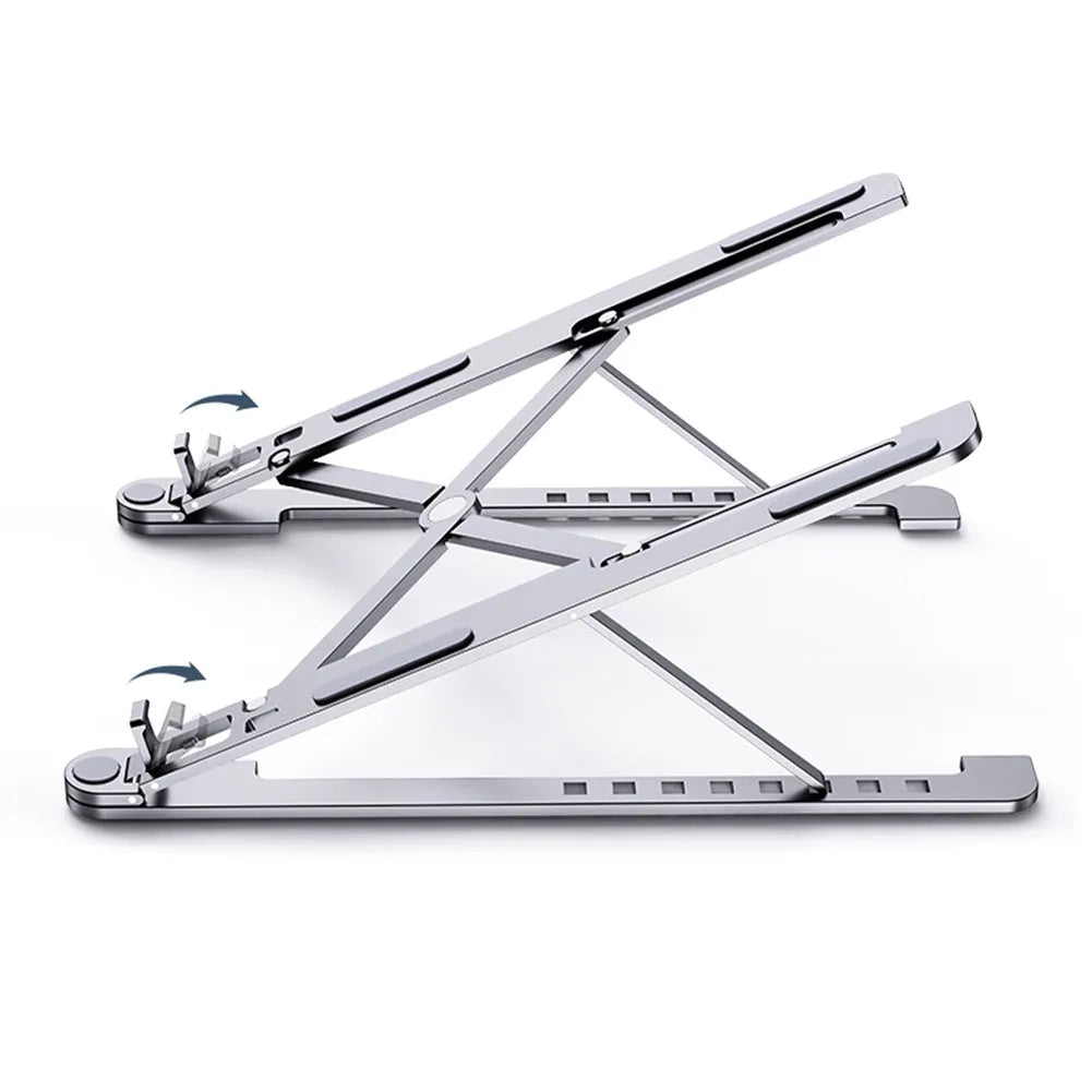 Silver foldable aluminium laptop stand holding a MacBook at an adjusted angle