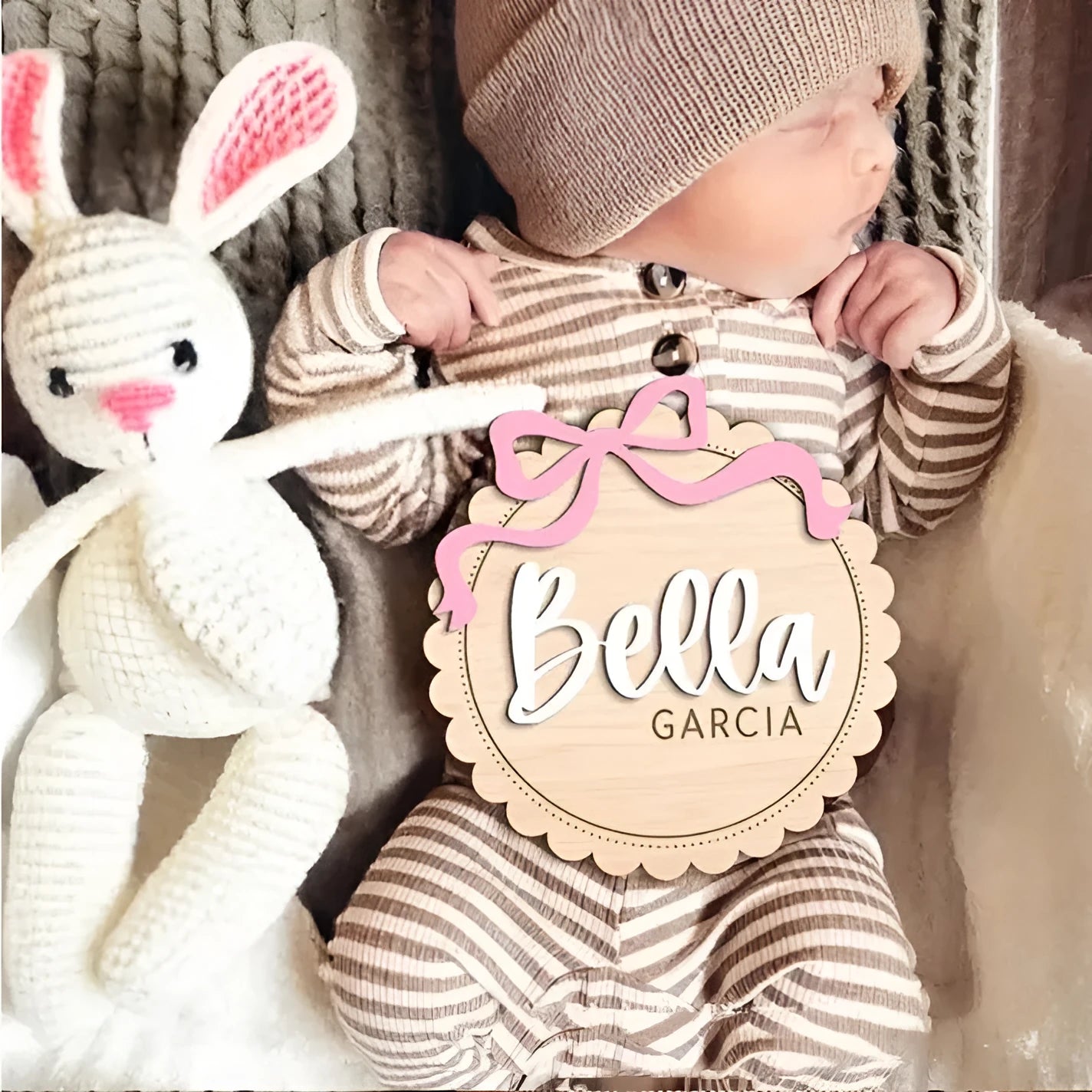 Square wooden baby room ornament with customised name engraving for nursery decor.