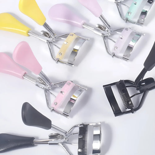 A4 carbon steel eyelash curler with comb attachment in selected colour