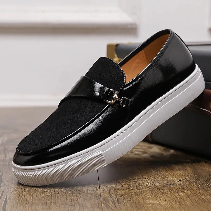 Men's black slip-on shoes with gold horsebit buckle and round toe stitching design