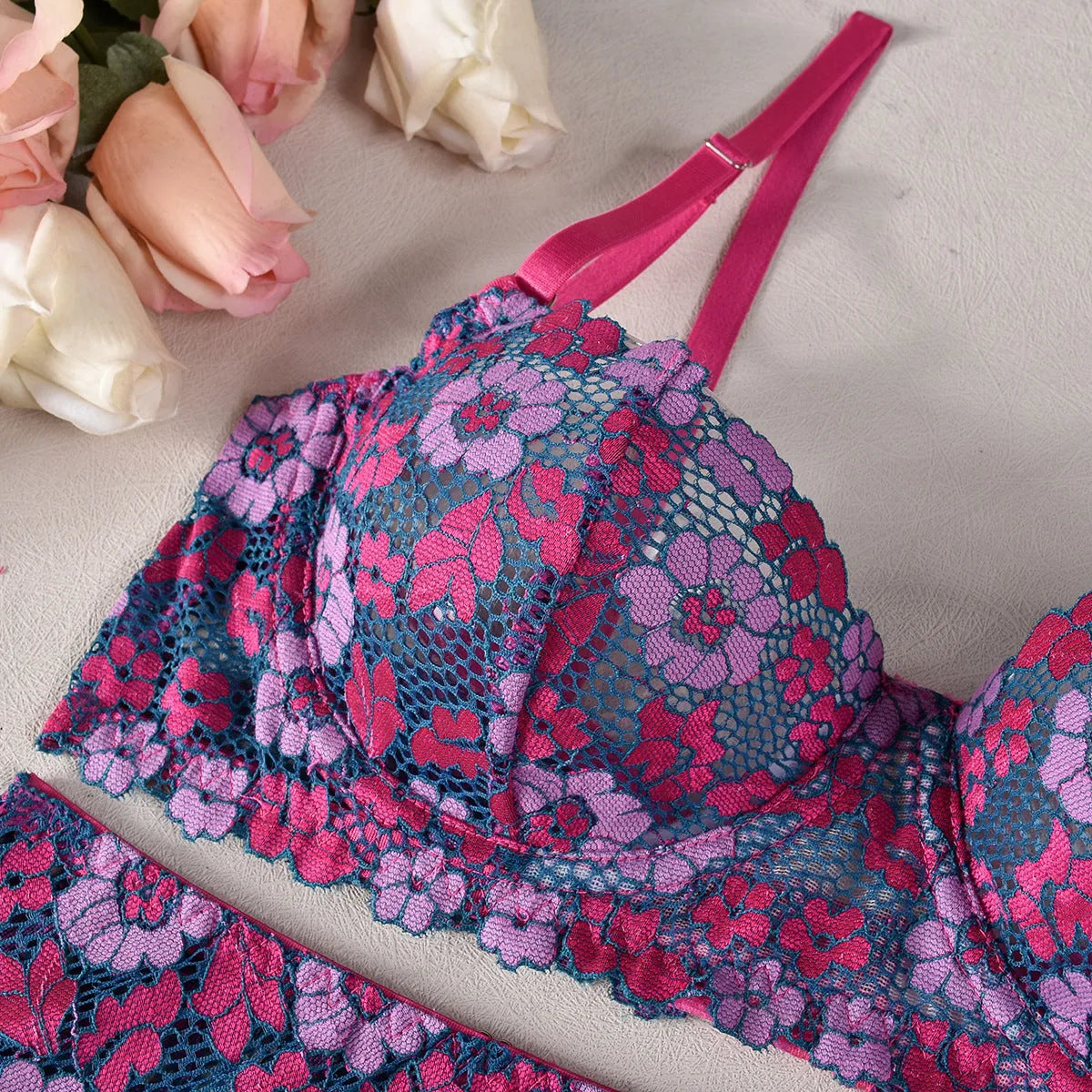 Rose red women's bikini with contrast embroidery detail, polyester fabric construction