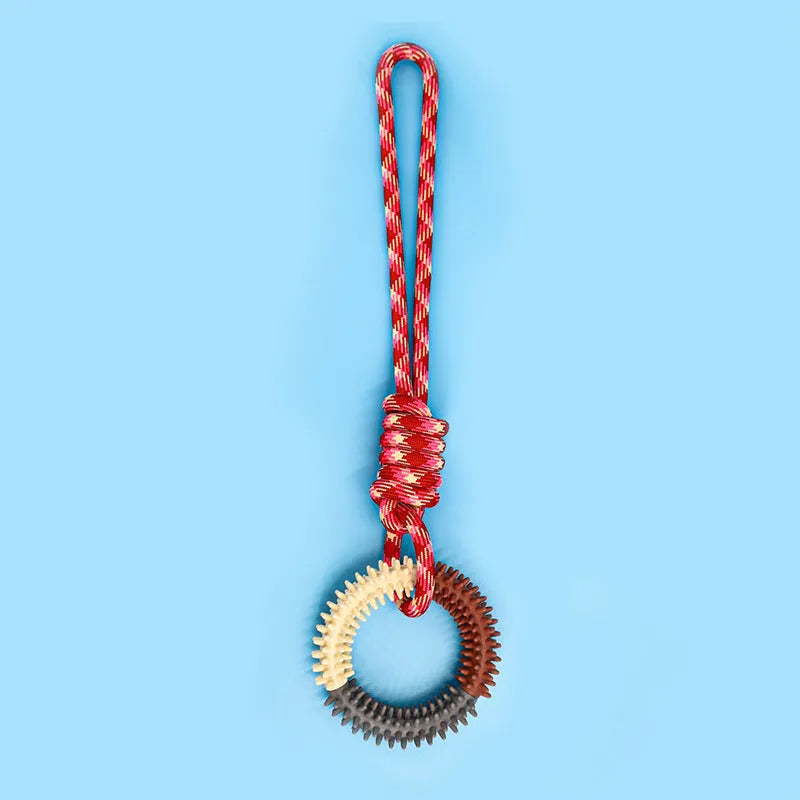 Long blue braided rope dog toy with a central knot, shown on a white background