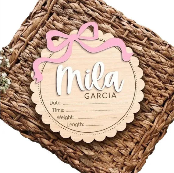 Square wooden baby room ornament with customised name engraving for nursery decor.
