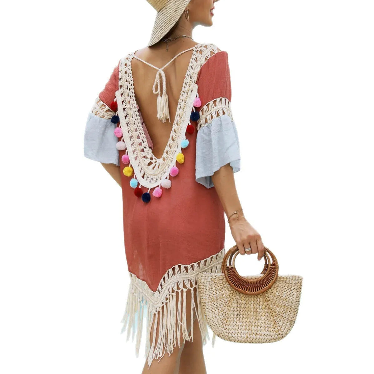 Orange hand crochet beach overskirt with floral pattern and tassel decoration