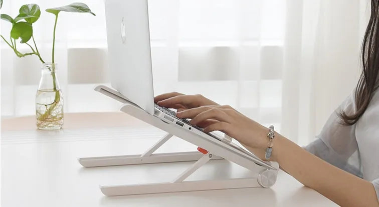 White aluminium laptop stand for Apple MacBook with folding design