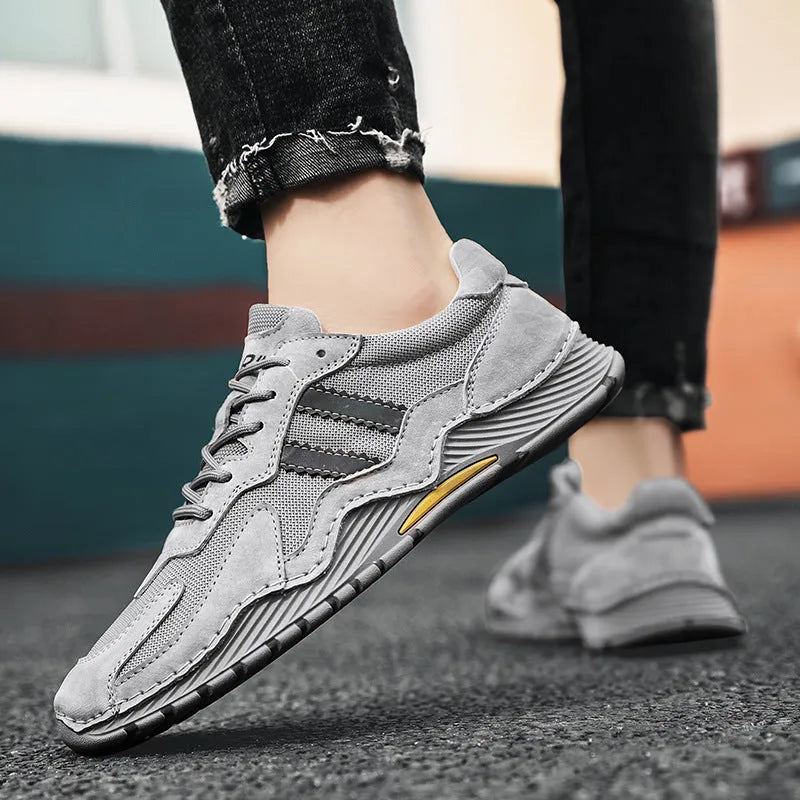 Men's low-top grey pigskin platform hiking boots with lace-up front and rubber sole.