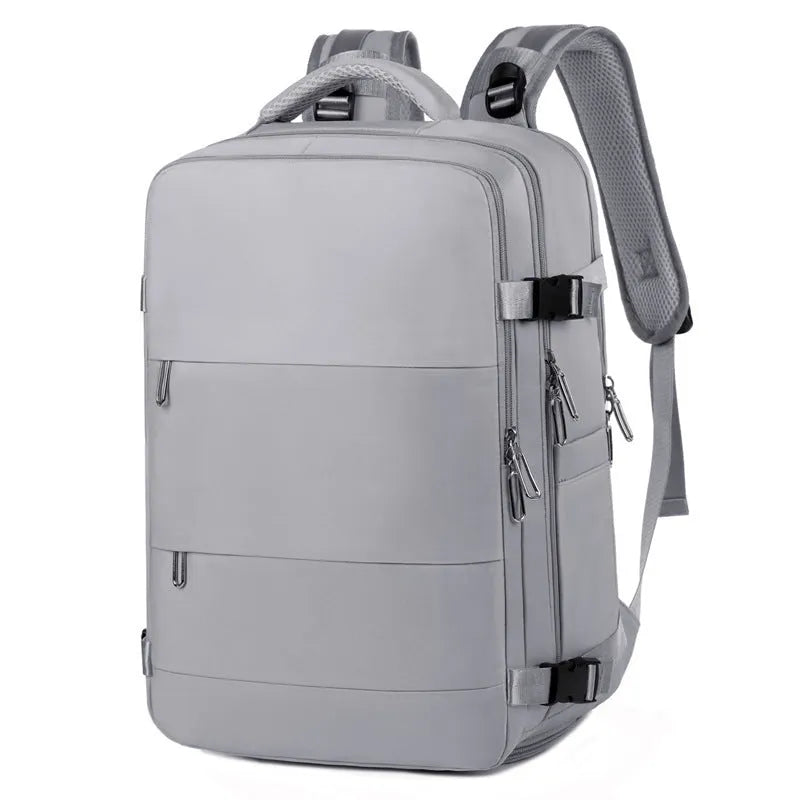 Large purple waterproof Oxford cloth travel backpack showing organisational pockets and air pillow belt