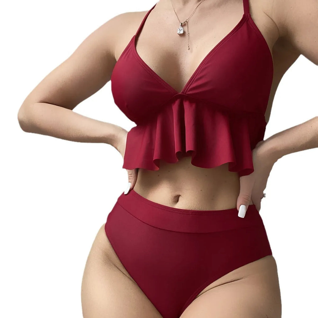 Women's solid colour split bikini swimsuit in black on a model