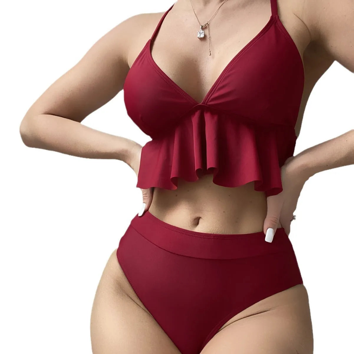 Women's solid colour split bikini swimsuit in black on a model