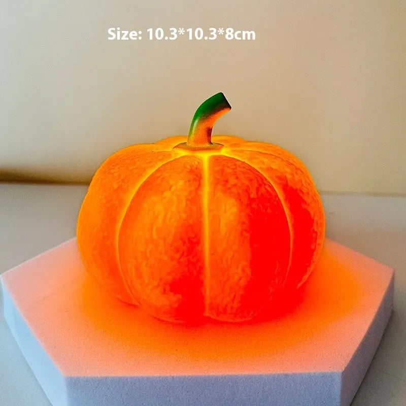 Pumpkin-shaped rechargeable decorative night light on a bedside table, 10.3 x 8 cm
