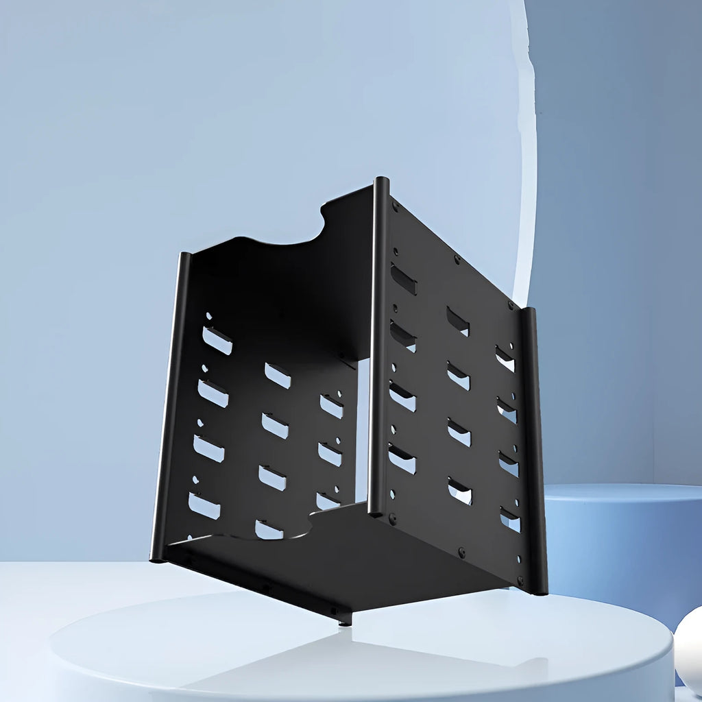 Black metal 5-layer hard drive storage bracket for 3.5-inch disks with screwdriver and screws on a desk