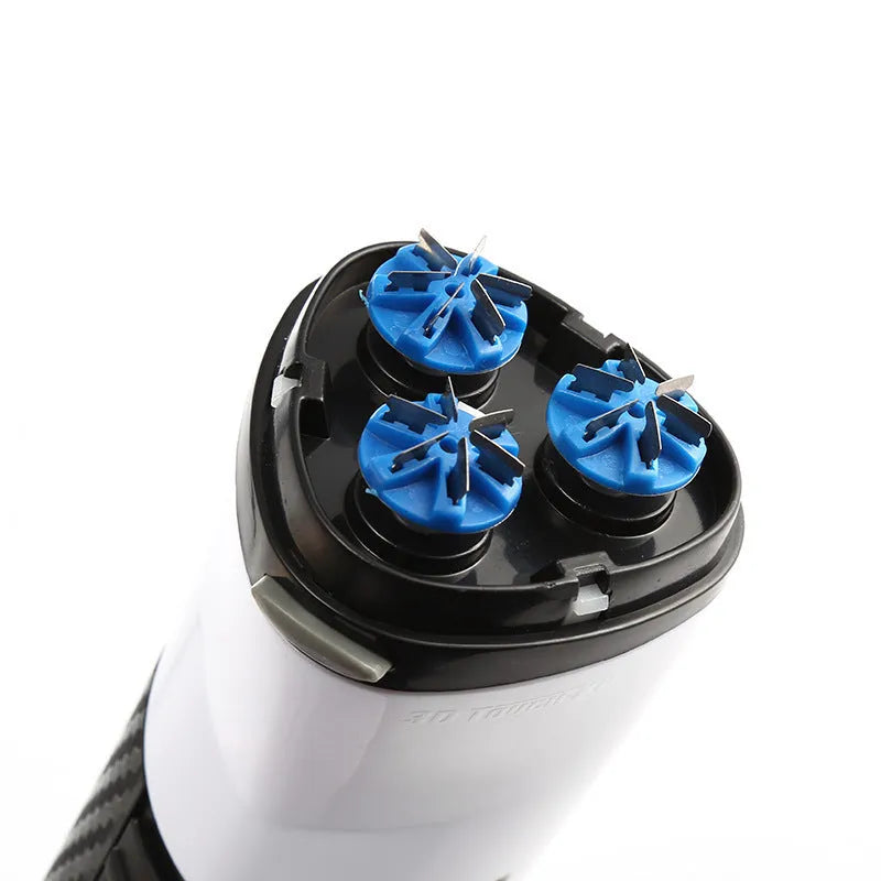 Black compact travel electric shaver with protective cap on a white background