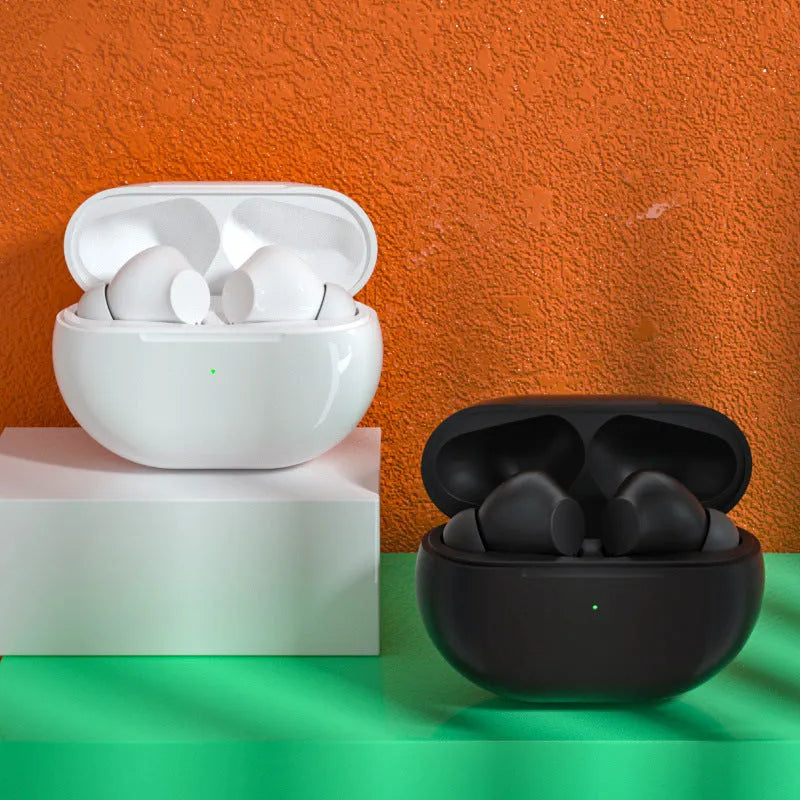Black and white Pro4 Bluetooth earbuds inside a compact rectangular charging case.