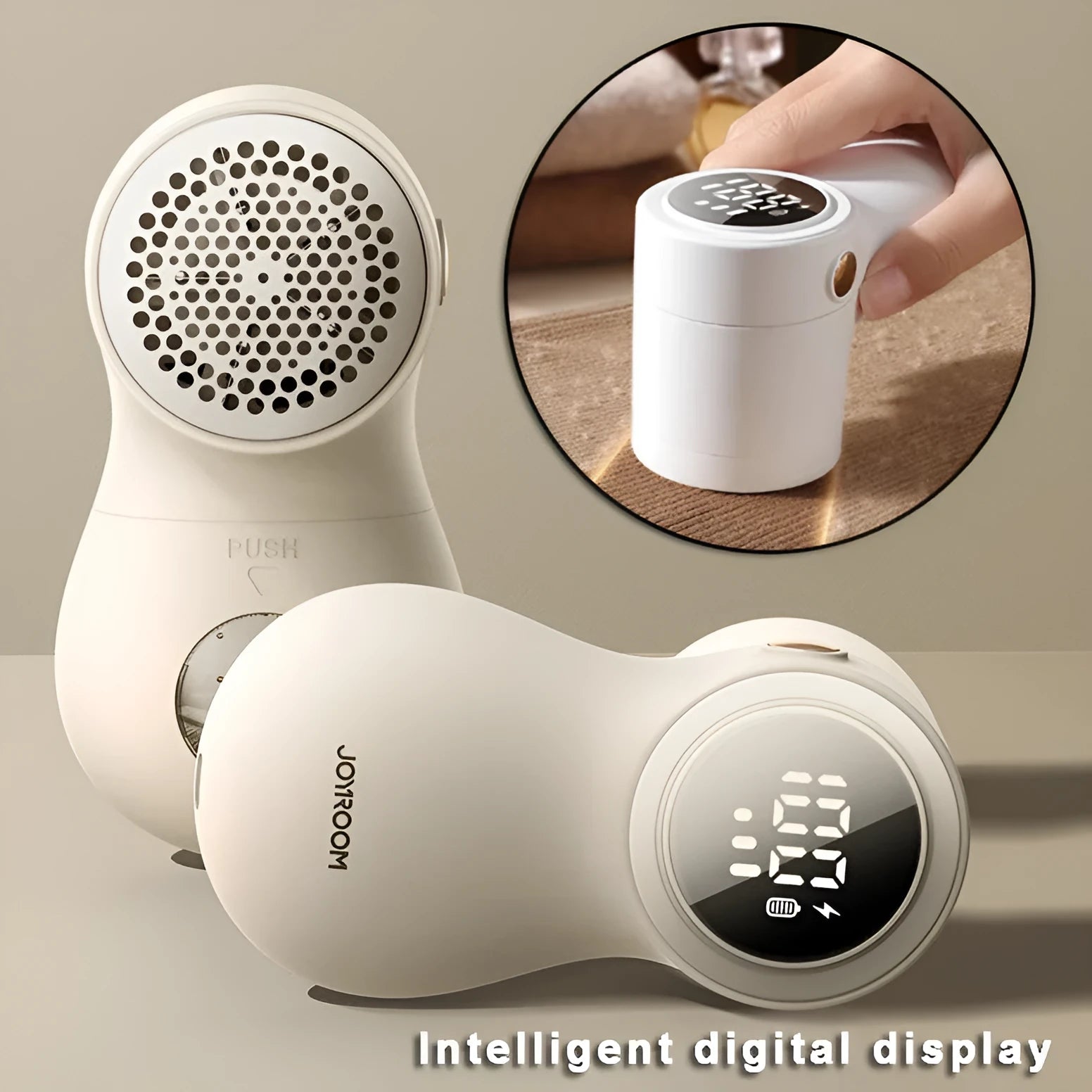 White electric lint remover with LED display showing battery level, placed beside clothing with fabric pilling