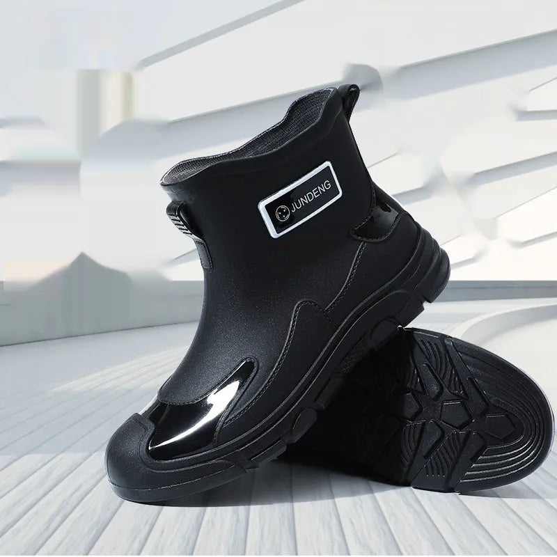 Adult low-cut waterproof wellington boots in PVC with an integrated moulded sole, shown in khaki colour.