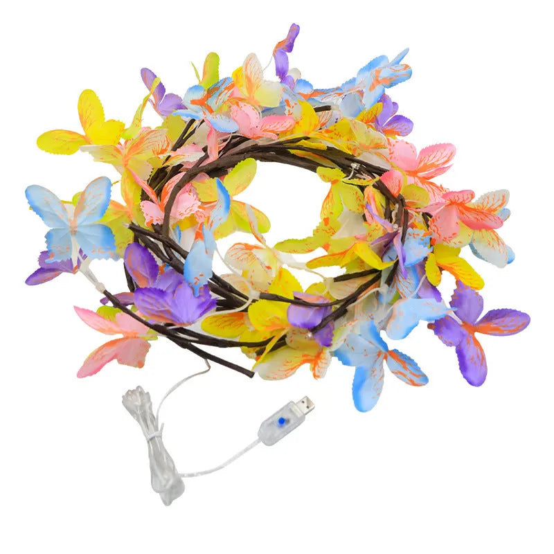 Flexible LED butterfly tree lamp with colourful ornaments on 1.8 metre rattan vines