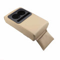 Beige leather car armrest box with water cup holder on a car centre console