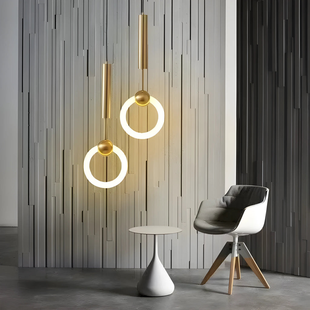 Compact Nordic minimalist U-shaped white pendant light with fabric cord, shown mounted beside a bed.