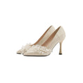Women's stiletto heels in champagne colour with satin upper, pointed toe, and decorative lace and beading