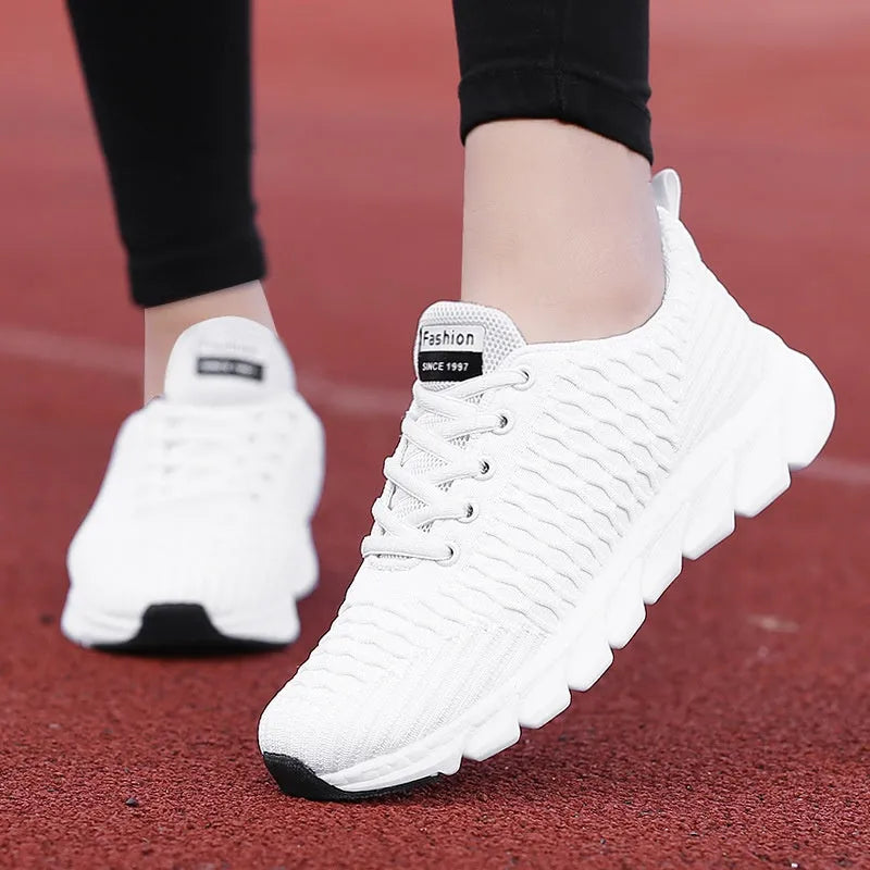 Women's black running shoes with fly weaving upper and wear-resistant outsole.