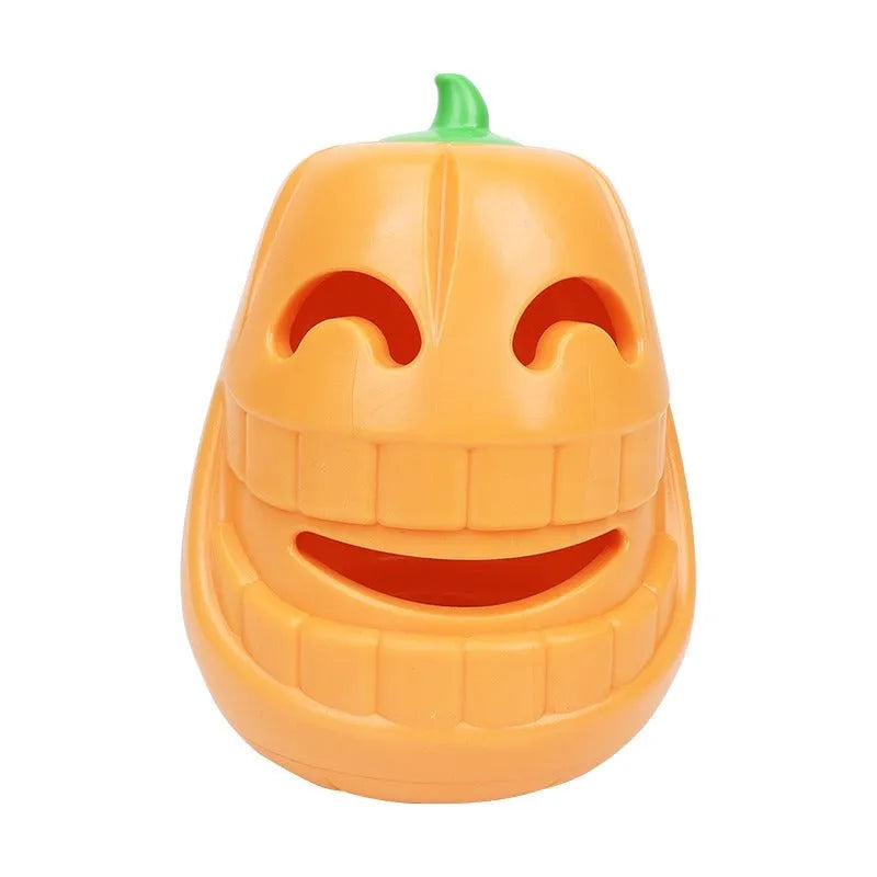 Orange Halloween pumpkin shaped rubber dog toy with a treat-dispensing funnel hole.