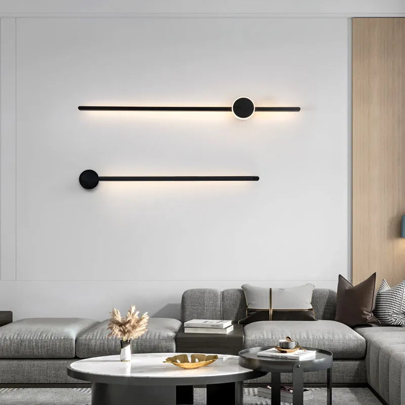 Simple modern wall lamp with a long acrylic shade and grid-free strip light design.